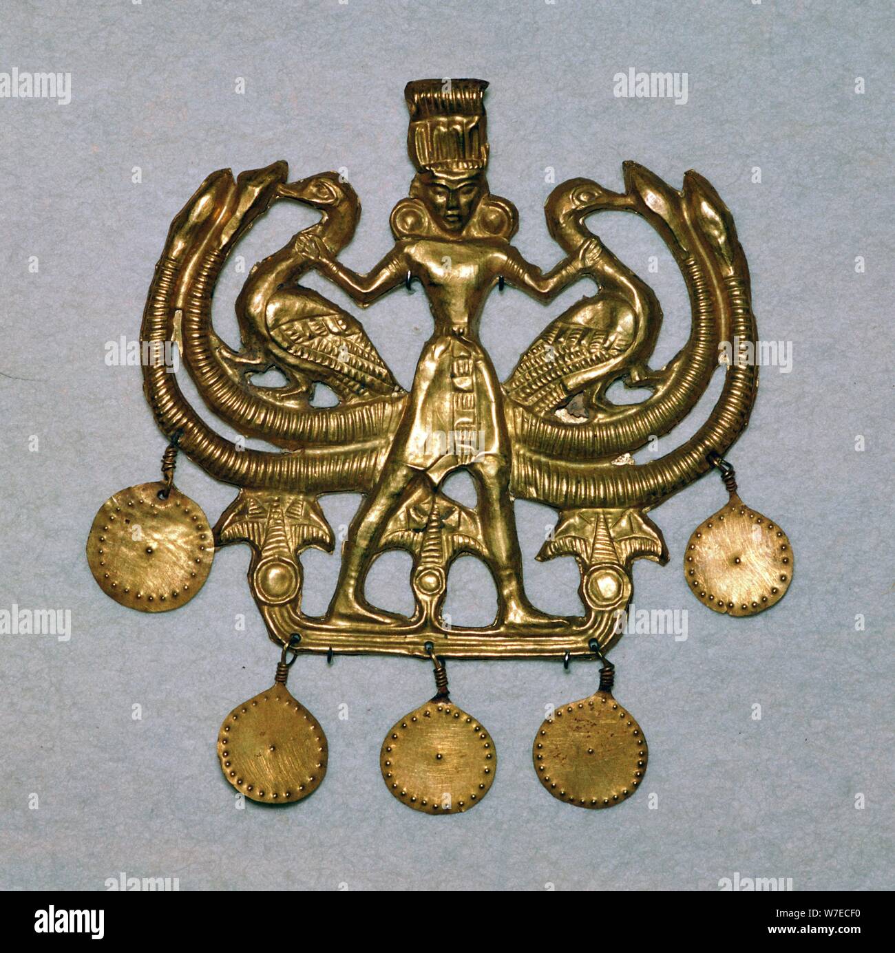 Gold pendant from the Aegina treasure, 17th century BC. Artist: Unknown Stock Photo