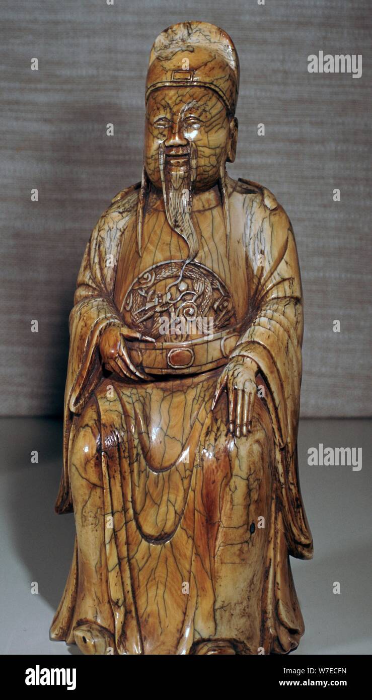 Ivory Chinese figurine of a Ming dynasty official, 17th century Stock