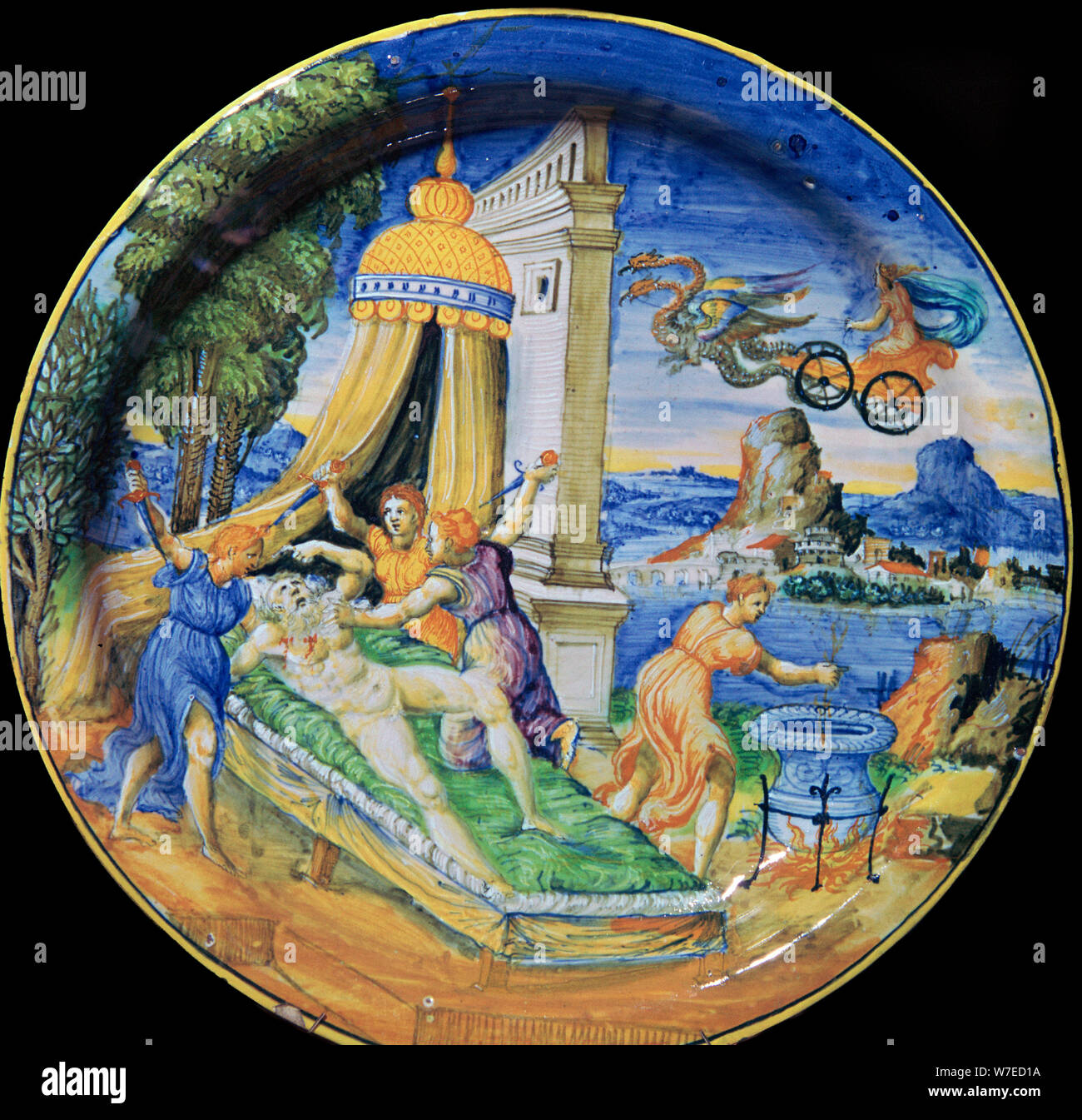 Italian earthenware plate showing Pelias being killed by his daughters, 16th century. Artist: Francesco Durantino Stock Photo