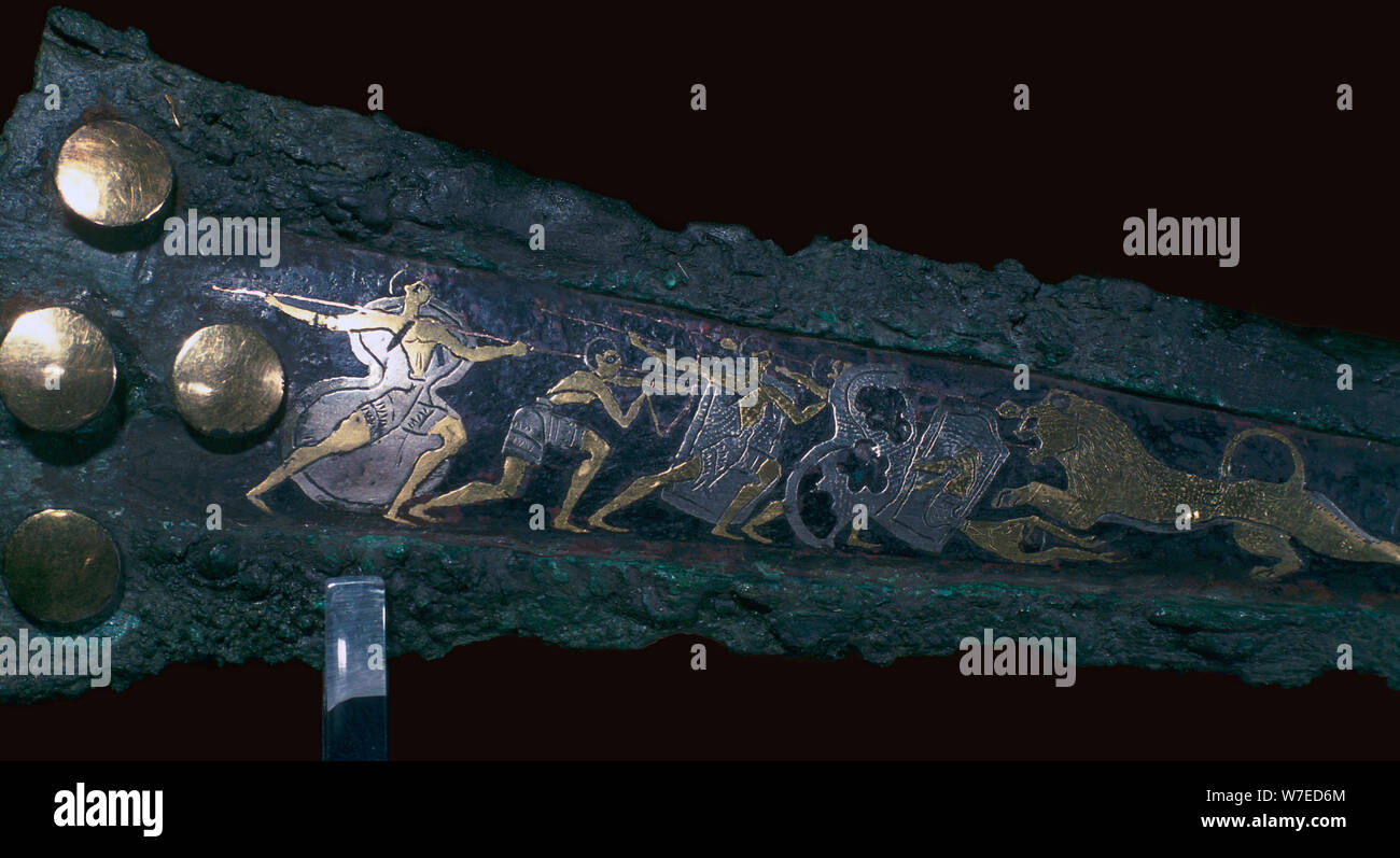 Detail of inlay on a Mycenaean bronze dagger showing a lion hunt, 16th century. Artist: Unknown Stock Photo