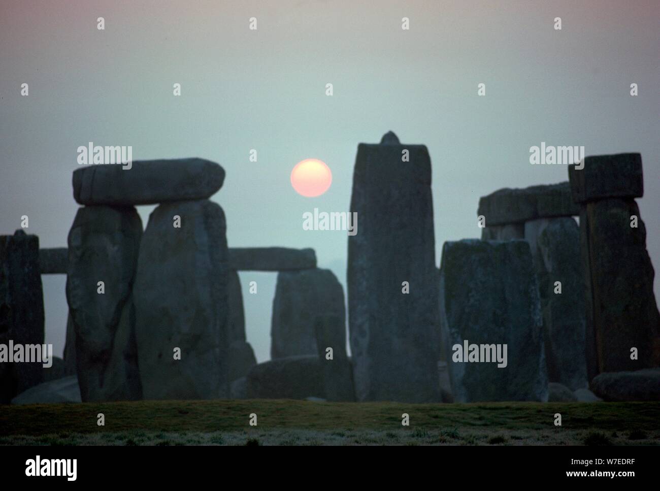Stonehenge at sunrise, 25th century BC. Artist: Unknown Stock Photo