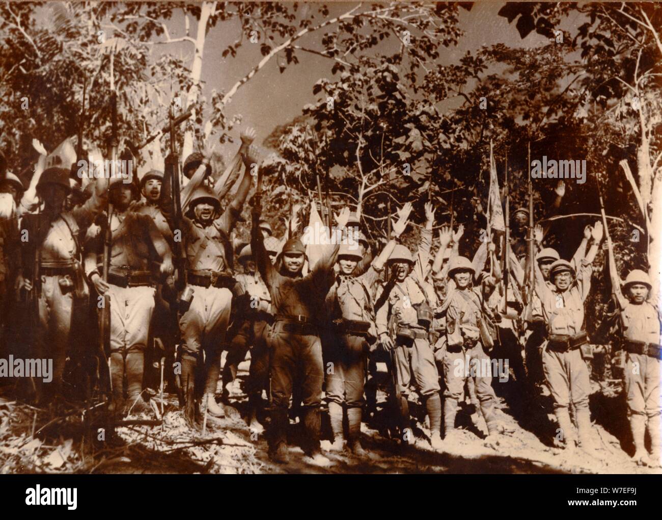 Japanese soldiers celebrate victory, Bataan, Philippines, World War II, 1942. Artist: Unknown Stock Photo