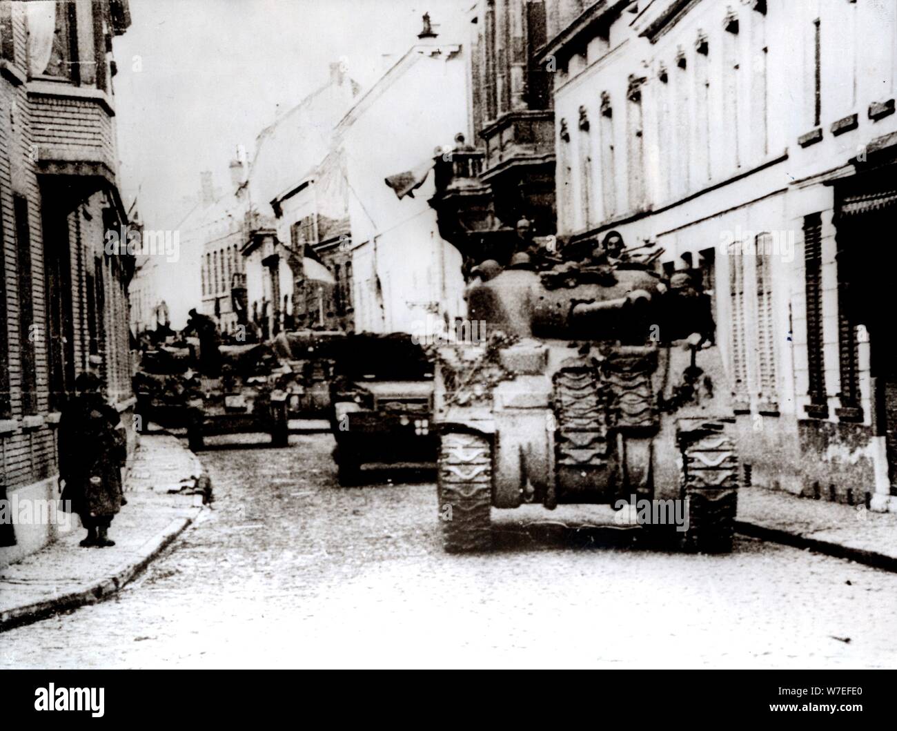 Polish tanks advance through the town of Tielt, Belgium, c1944. Artist ...