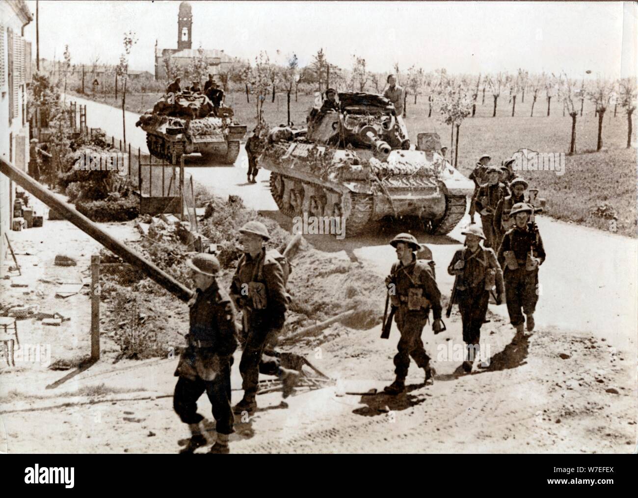 British 8th Army troops and tanks on the road to Ferrara, Italy, April 1945. Artist: Unknown Stock Photo