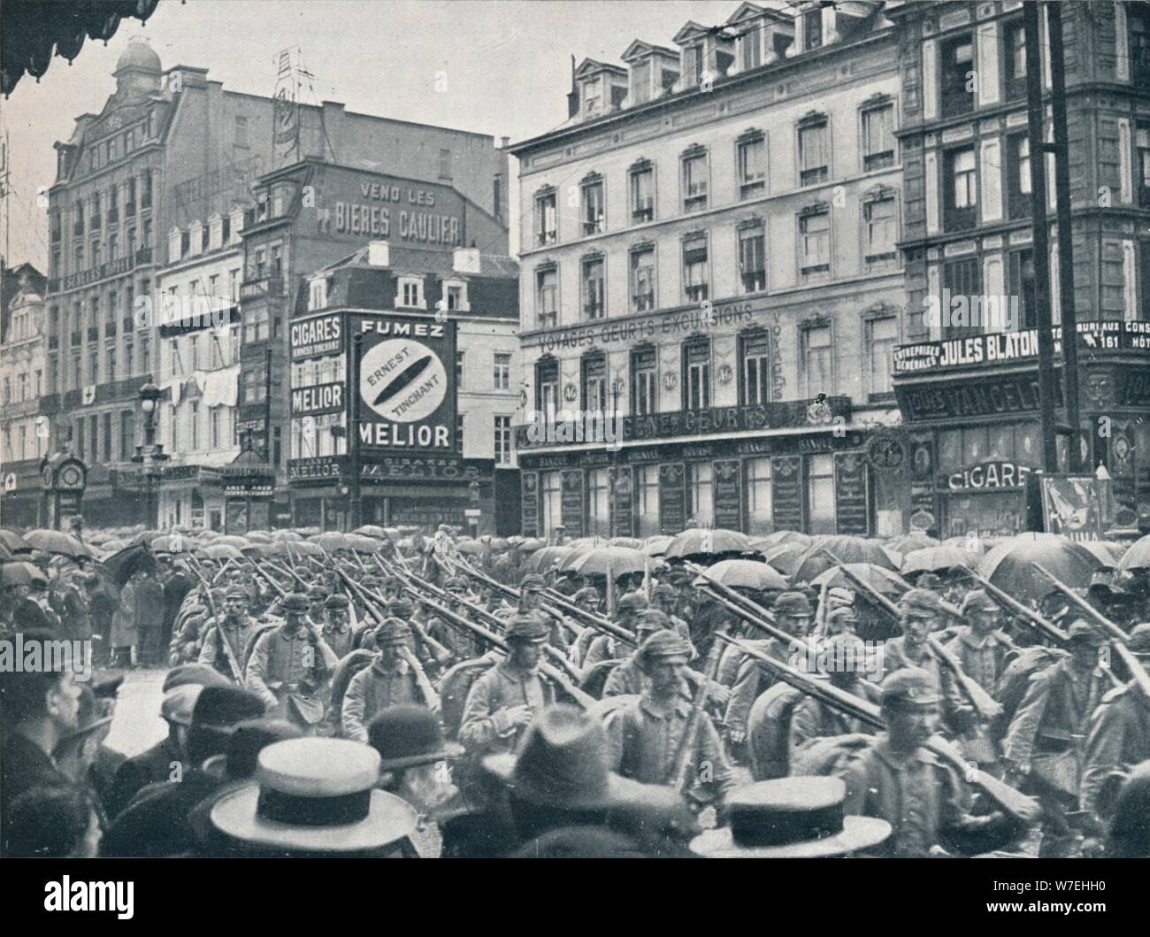 German Infantry entering Brussels in the rain, 1914. Artist: Unknown Stock Photo