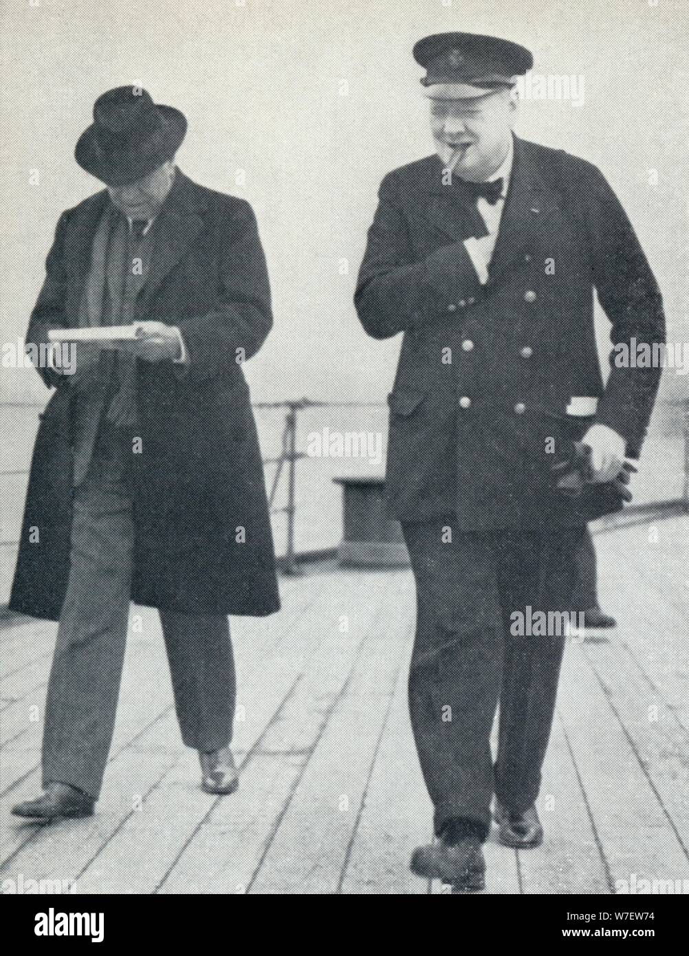 'Churchill, jubilant, aboard H.M.S. Prince of Wales with Lord Beaverbrook, about to say farewell t Stock Photo
