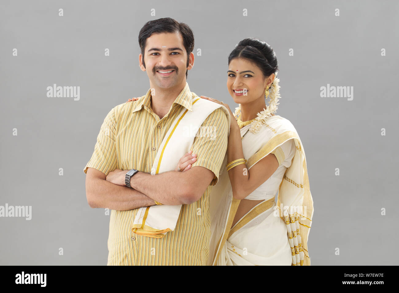 Portrait of a South Indian couple smiling Stock Photo - Alamy