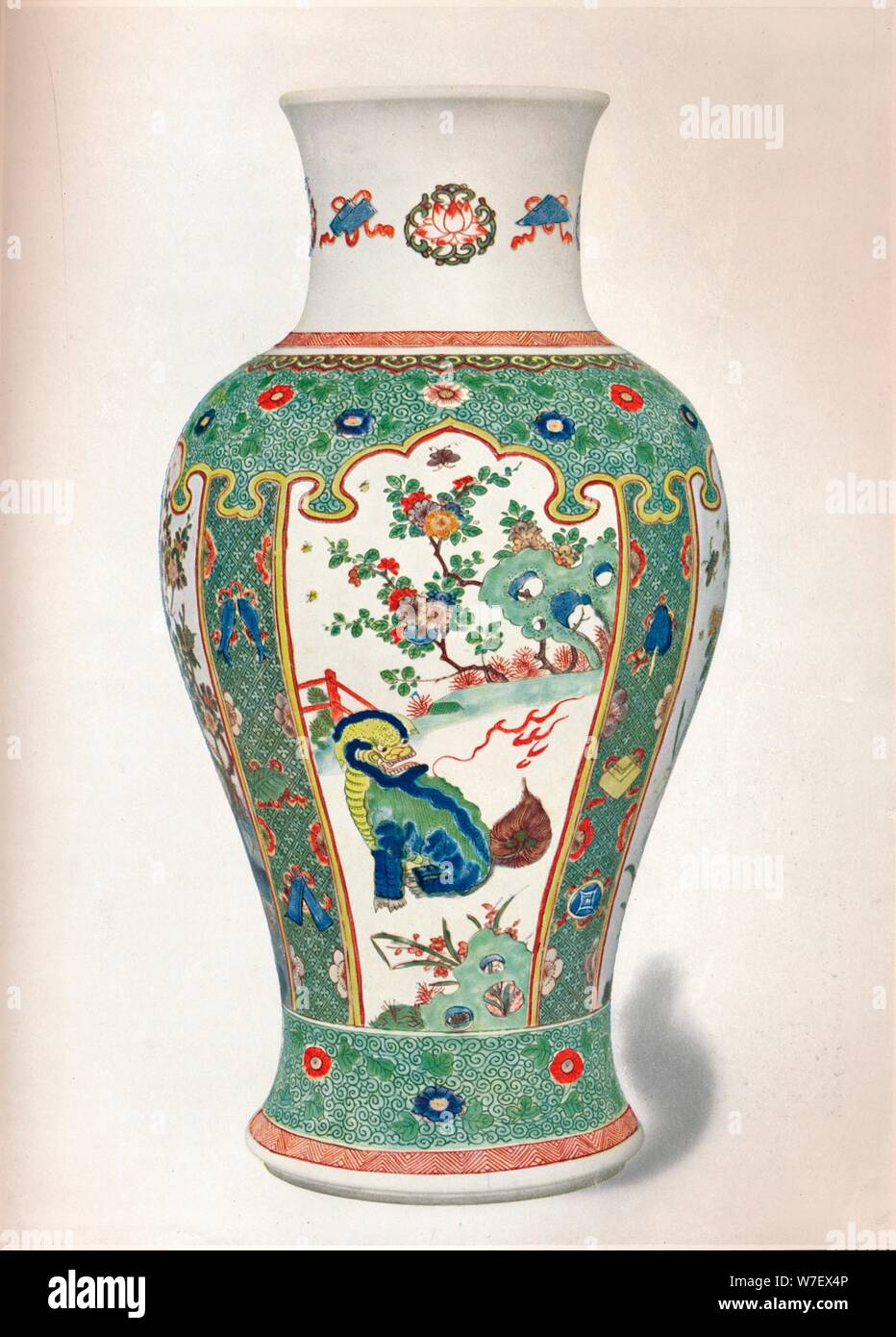 'Famille Verte Vase, with four upright panels painted with rocks and flowering plants, two monsters, Artist: Unknown. Stock Photo