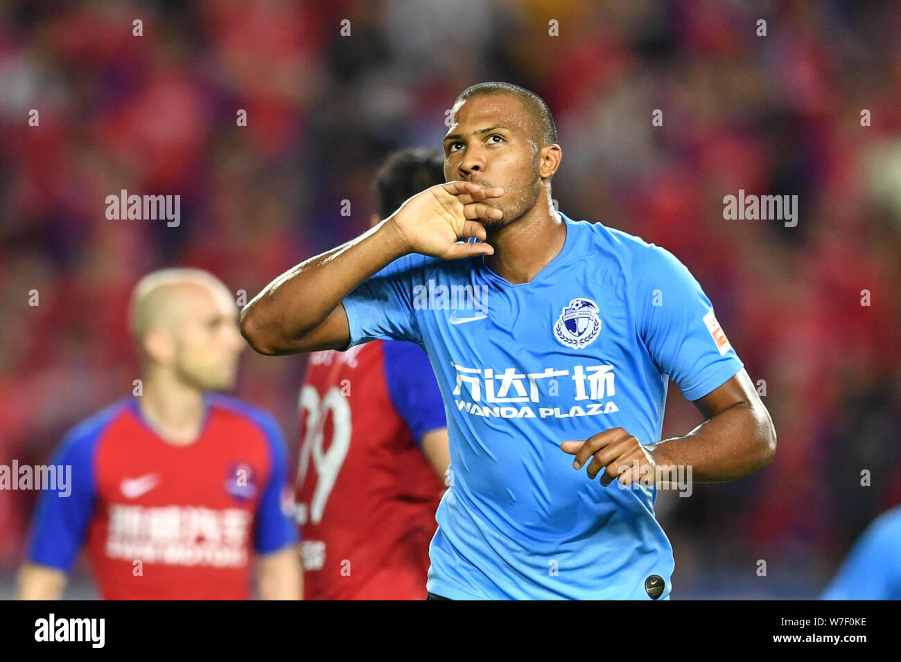 Venezuelan football player Salomon Rondon of Dalian Yifang celebrates after  scoring against Chongqing SWM in their 21st round match during the 2019  Chinese Football Association Super League (CSL) in Chongqing, China, 2