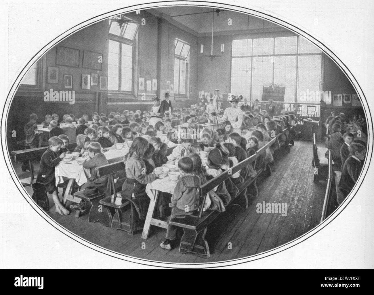 A Ragged School Union dinner, Camberwell, London, c1901 (1901). Artist: Unknown. Stock Photo