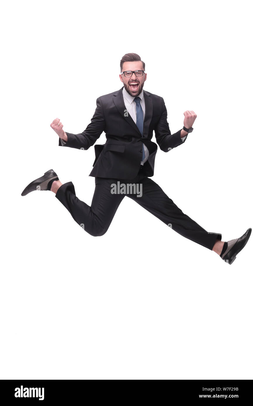 in full growth. happy dancing young businessman Stock Photo