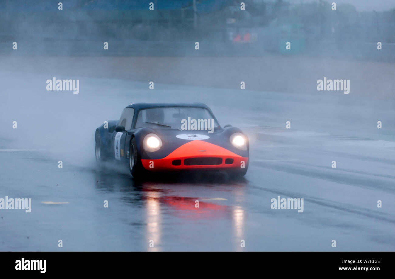 A Chevron B8 in heavy rain during the HSCC Thundersports Race, at the 2019 Silverstone Classic Stock Photo