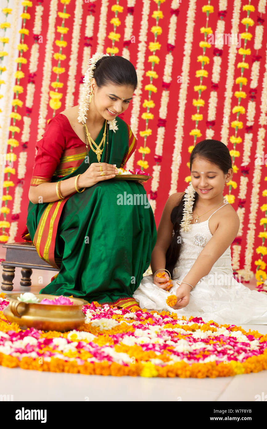 Making rangoli family hi-res stock photography and images - Alamy