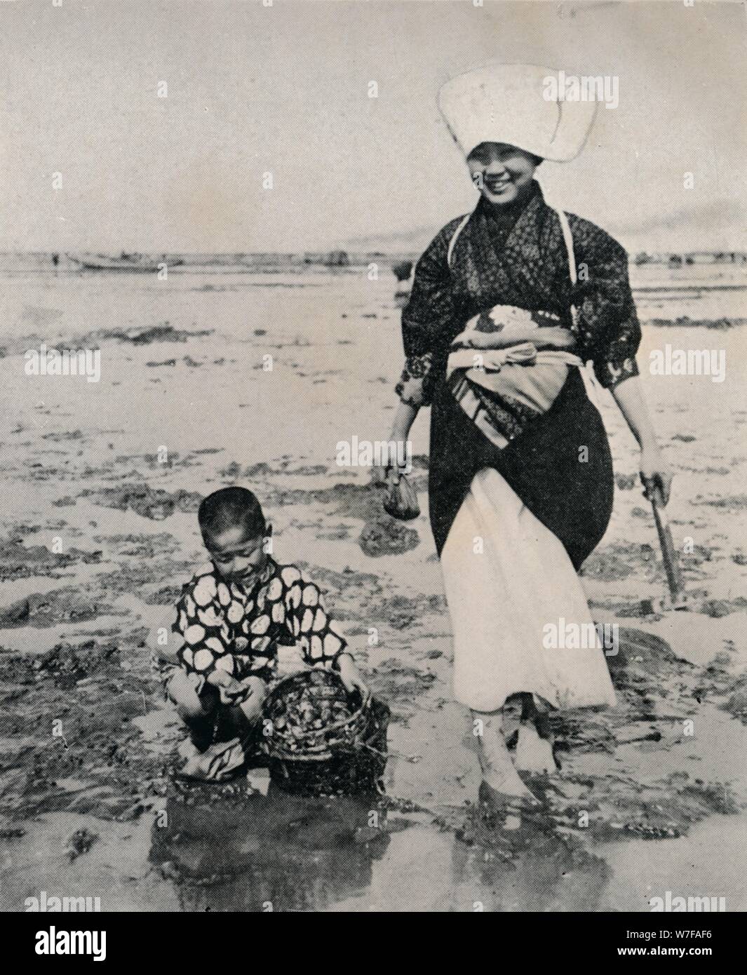 'Digging clams at lowtide in Tokyo Bay', c1900, (1921). Artist Julian