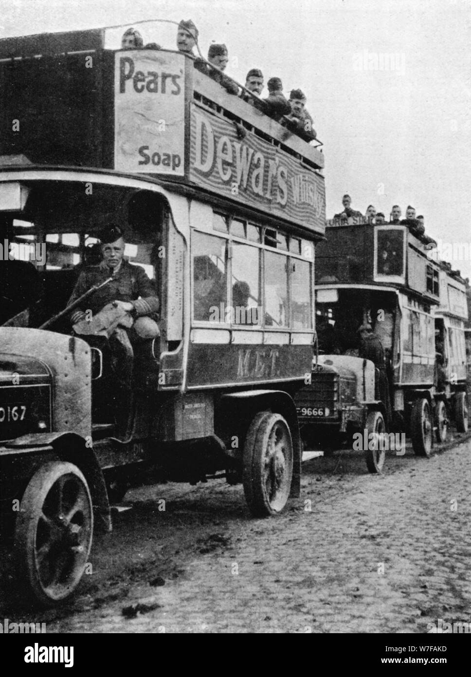 'British troops being moved to a fresh part of the line by motor 'buses', 1915. Artist: Unknown. Stock Photo