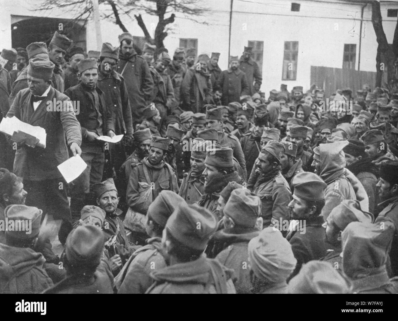 'Issuing passes for a few days leave at home to the wounded Serbian troops at Nish', 1915. Artist: Unknown. Stock Photo