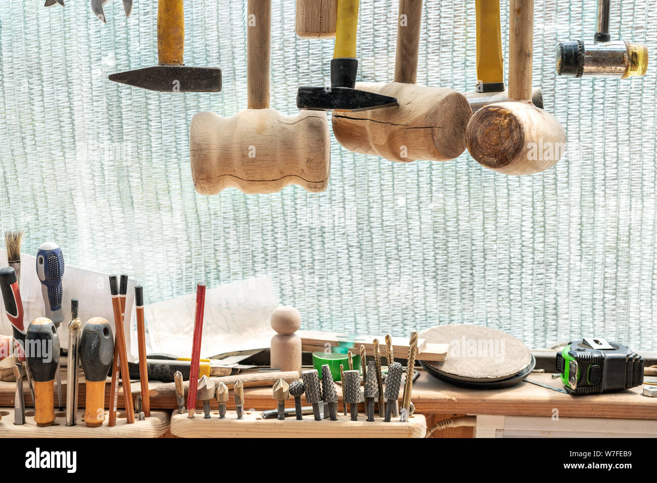 Closeup woodwork tool set. Different hammers, Raspfile burr