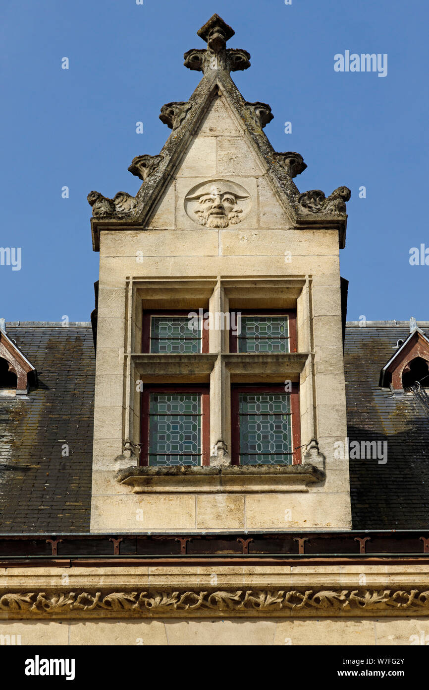 Detail of the 1914 Neo-Gothic Libourne Town Hall, near Bordeaux, in the Gironde department, France. Dorma styled window. Stock Photo