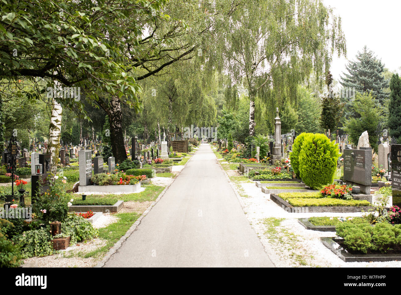 Walkways pass by tombs and grave sites at the St Barbara cemetery in ...