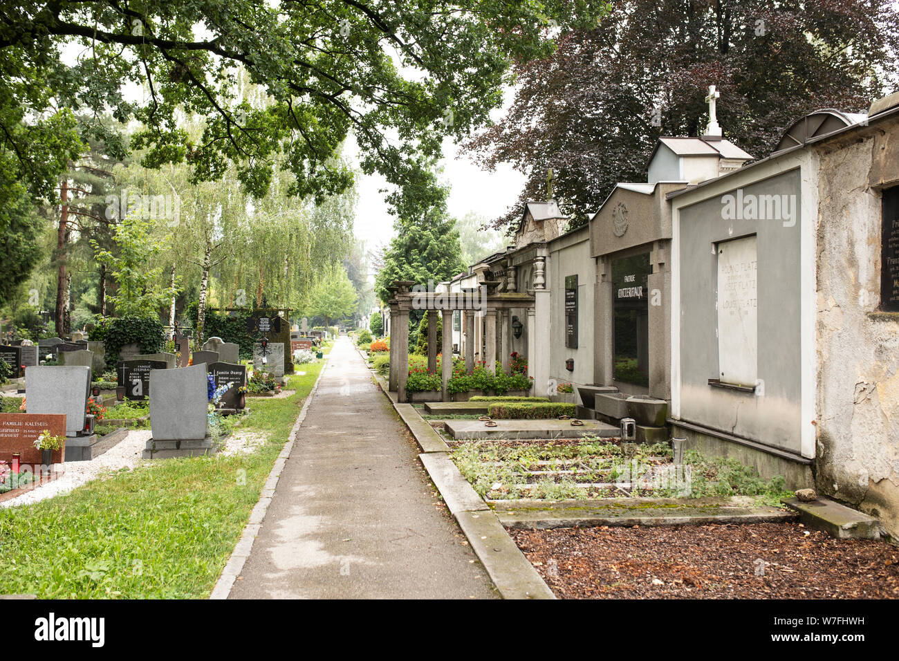 Walkways pass by tombs and grave sites at the St Barbara cemetery in ...