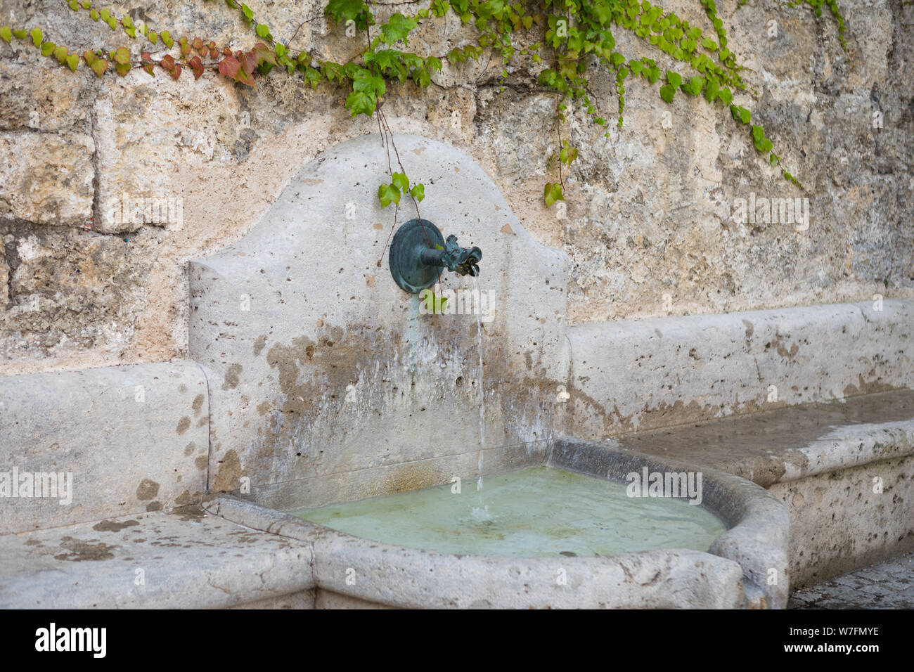 Natural spring water in Altotting, Bavaria, Germany Stock Photo Alamy