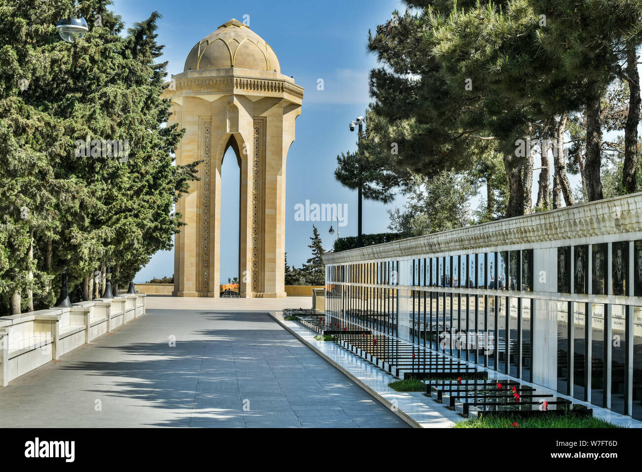 Baku, Azerbaijan - May 11, 2019. View of the Alley of Martyrs, towards the Eternal Flame Memorial, in Baku. View with graves and people. The Alley of Stock Photo