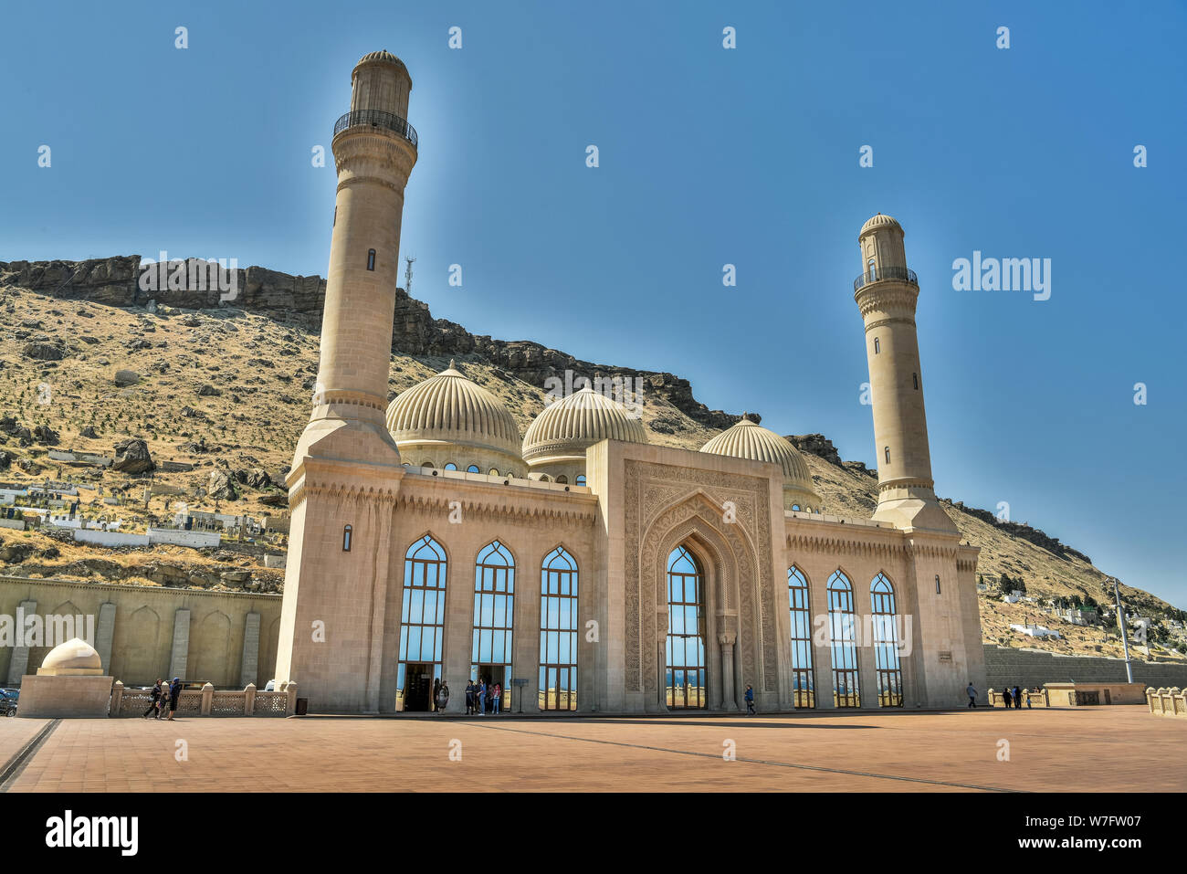 Bibi-Heybat, Baku, Azerbaijan - May 12, 2019. Exterior view of the Bibi-Heybat mosque in Baku, with people. The existing structure, built in the 1990s Stock Photo