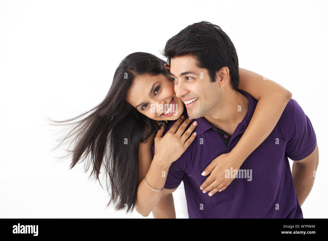 Man arm around woman behind hi-res stock photography and images - Alamy
