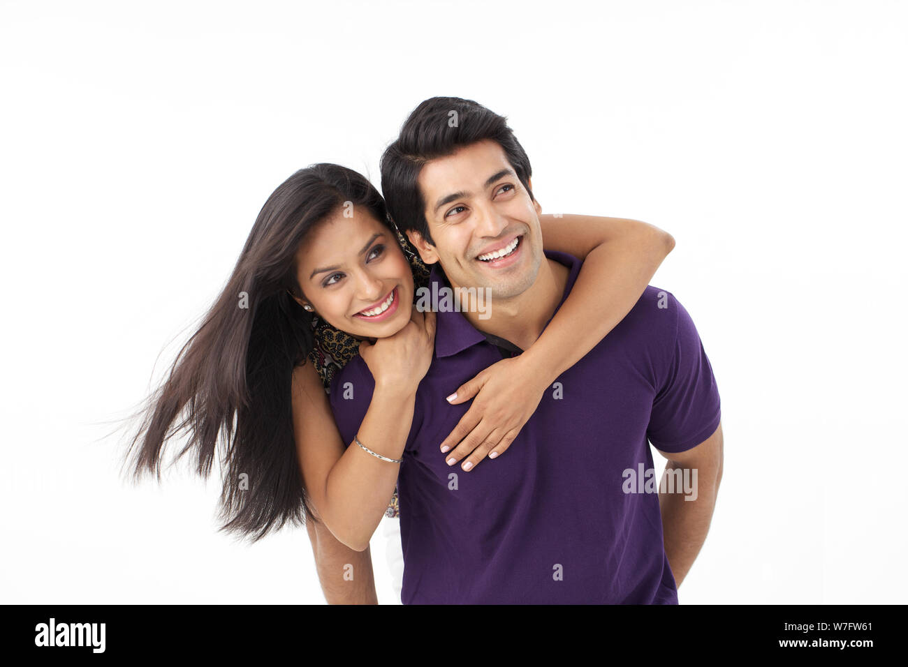 Man arm around woman behind hi-res stock photography and images - Alamy