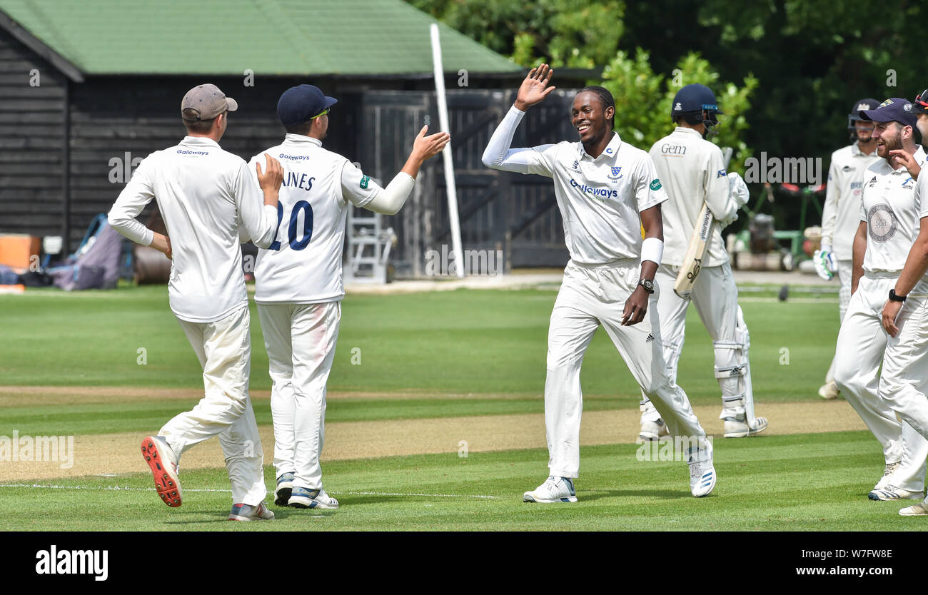 Henfield UK 6th August 2019 - England fast bowler Jofra Archer celebrates as he takes a wicket for the Sussex Second eleven cricket team against Gloucestershire Seconds at the Blackstone cricket ground near  Henfield just north of Brighton . Jofra Archer is hoping to prove his fitness so he can play against Australia in the next test match Credit : Simon Dack / Alamy Live News Stock Photo