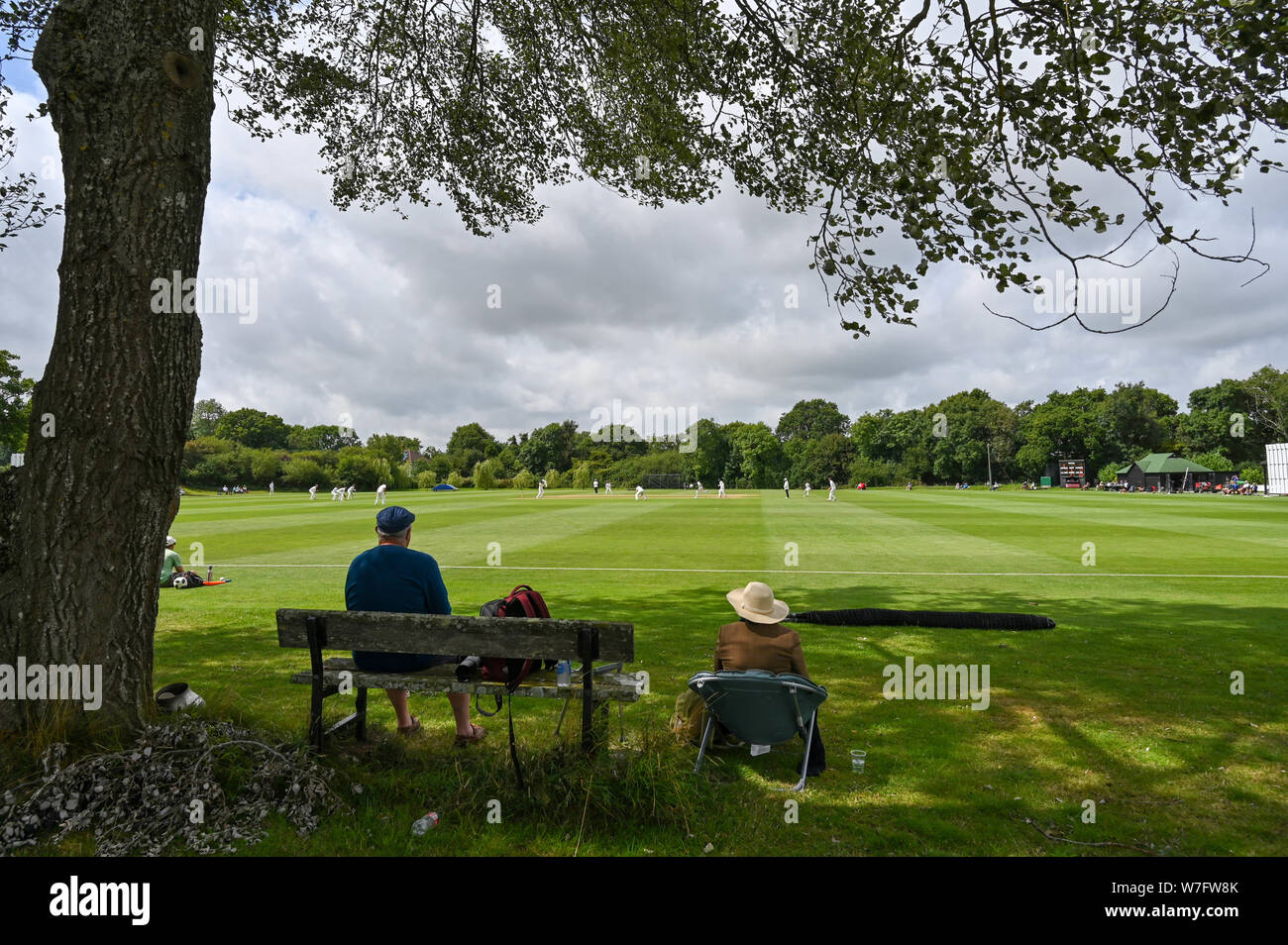 Henfield UK 6th August 2019 - Spectators watch Sussex Second eleven cricket team including Jofra Archer against Gloucestershire Seconds at the picturesque  Blackstone cricket ground near  Henfield just north of Brighton . Jofra Archer is hoping to prove his fitness so he can play against Australia in the next test match Credit : Simon Dack / Alamy Live News Stock Photo