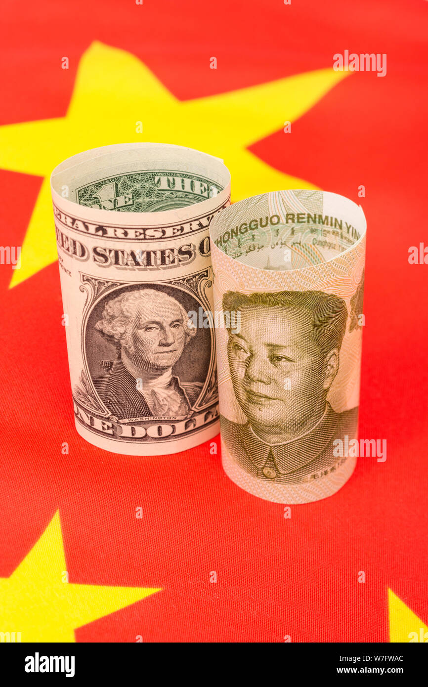 Chinese Yuan Renminbi banknote + U.S One Dollar bill & China flag. For Trump's reference China