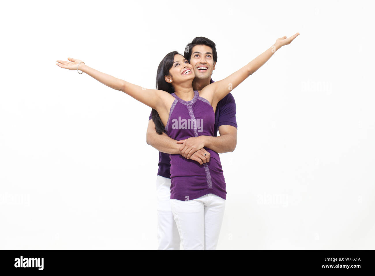 Man arm around woman behind hi-res stock photography and images - Alamy