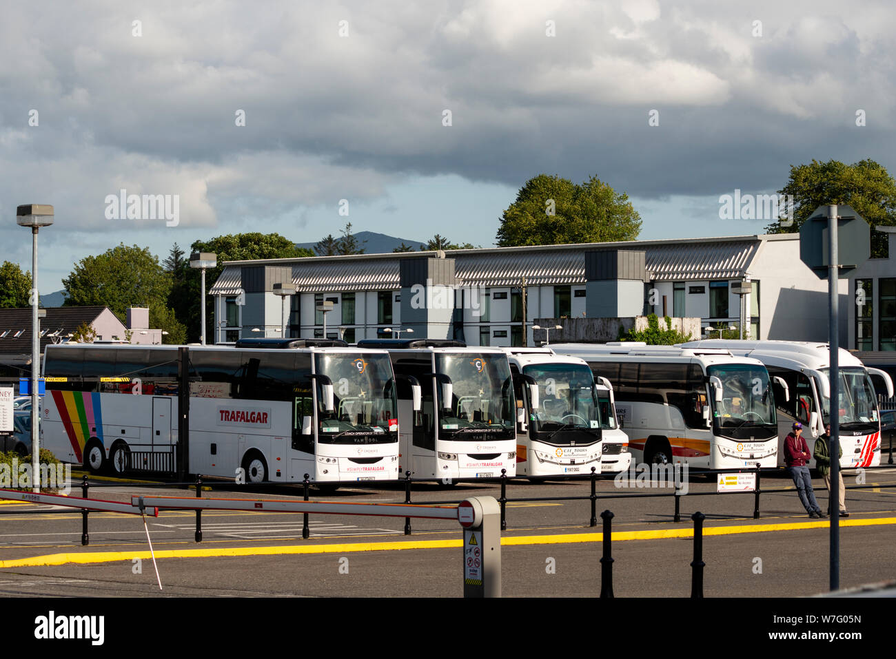 Killarney Ireland numerous tour buses coaches parked at bus station on