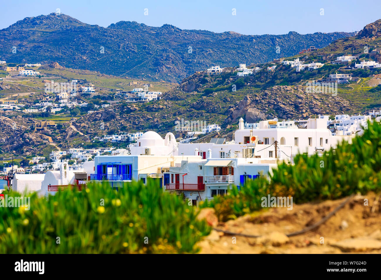 Mykonos, Greece aerial panoramic view of Little Venice white traditional houses and green plants Stock Photo