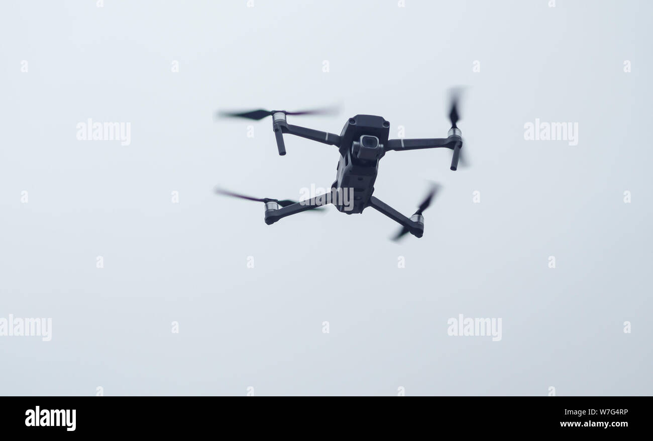 Drone or quadcopter  - unmanned aerial vehicle for video and photo. Stock Photo
