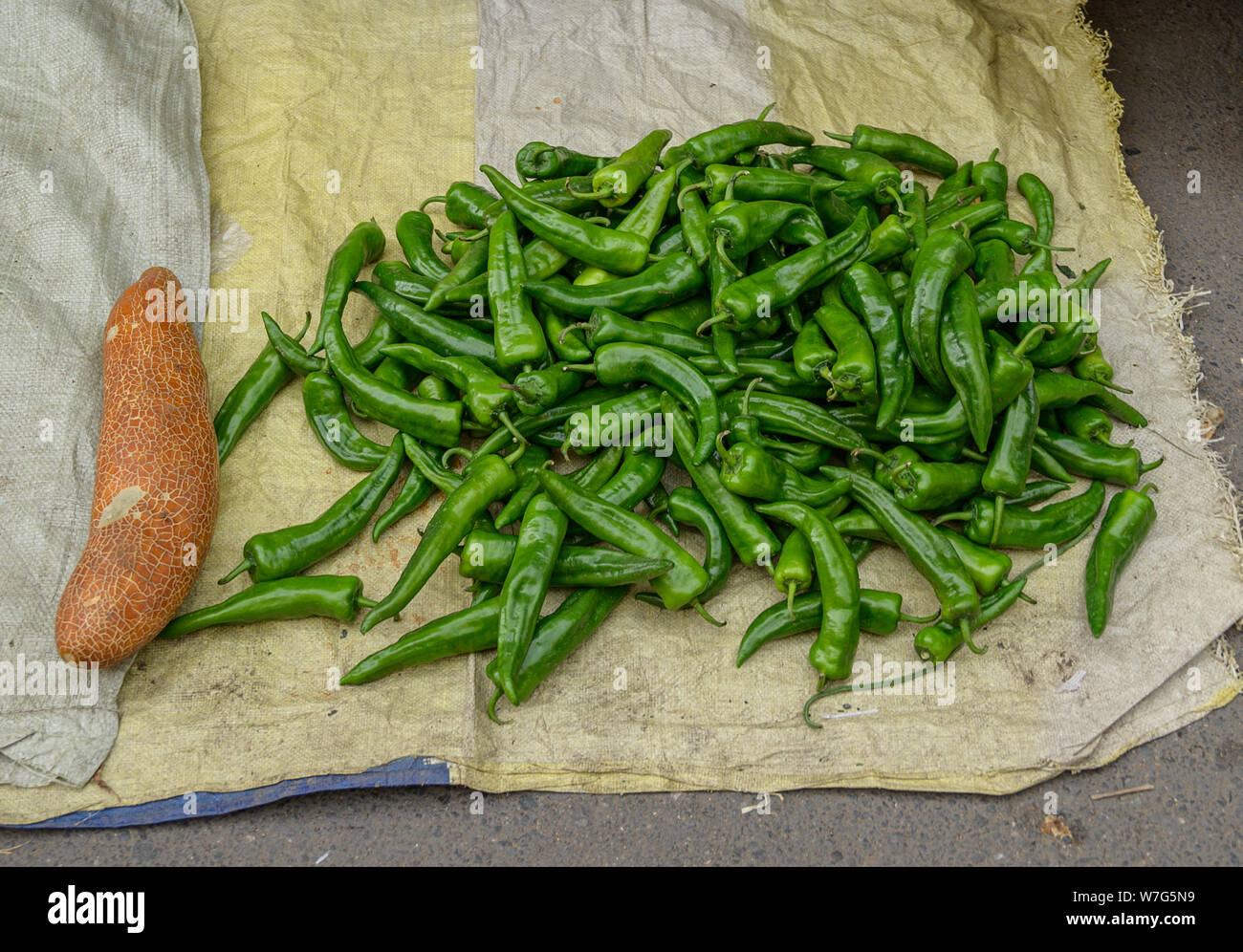 Spices in street market - green chili Stock Photo - Alamy