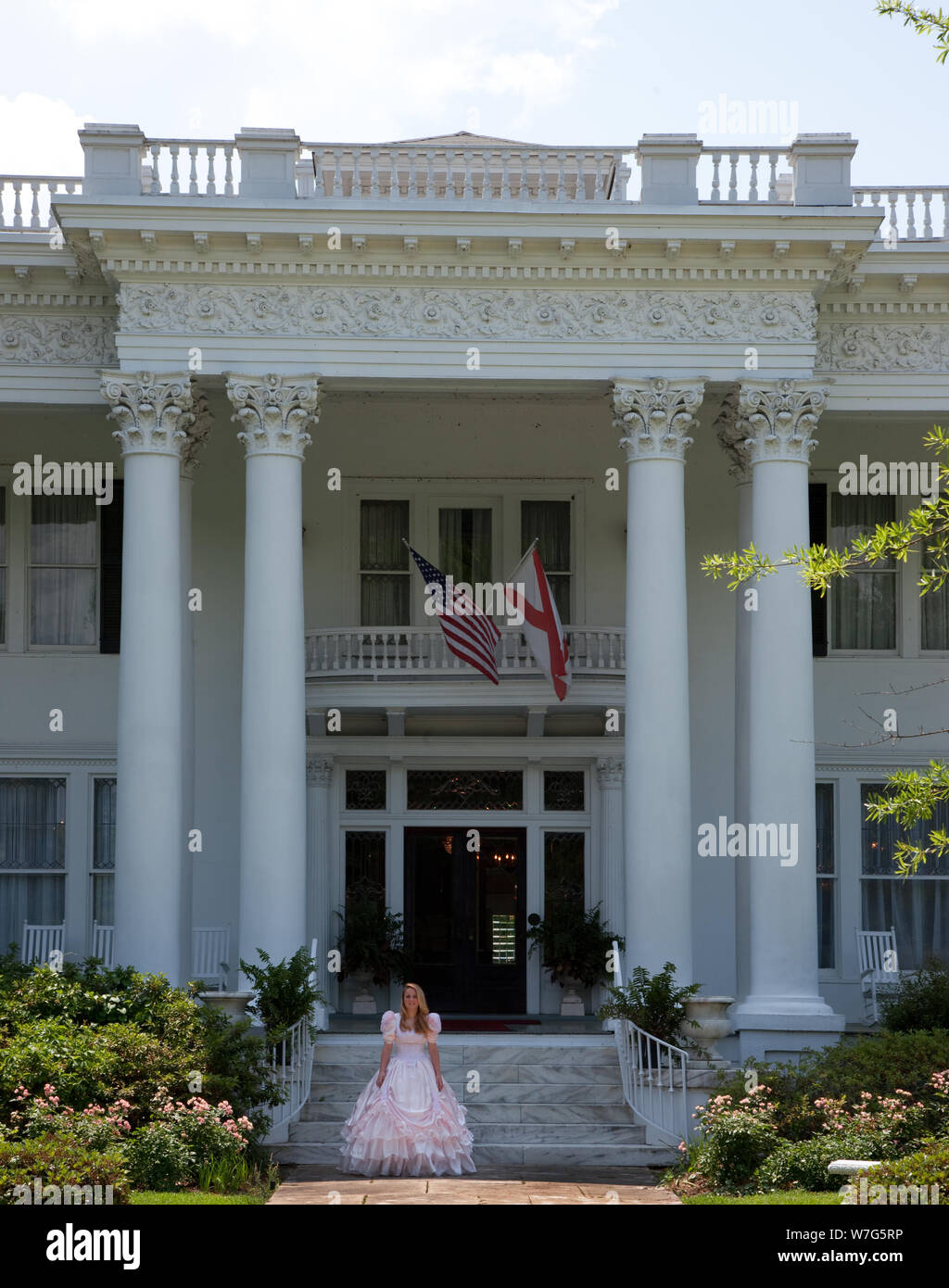 Andrea Michelle Pittman stands in front of the Shorter Mansion, Eufaula