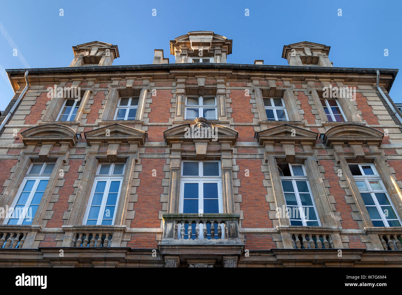 French architecture in the buildings surrounding Place des Vosges - the oldest public square in Paris, France Stock Photo