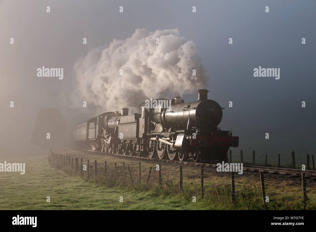 Manors 7812 and 7822 emerge from the mist on the Llangollen Railway Stock Photo