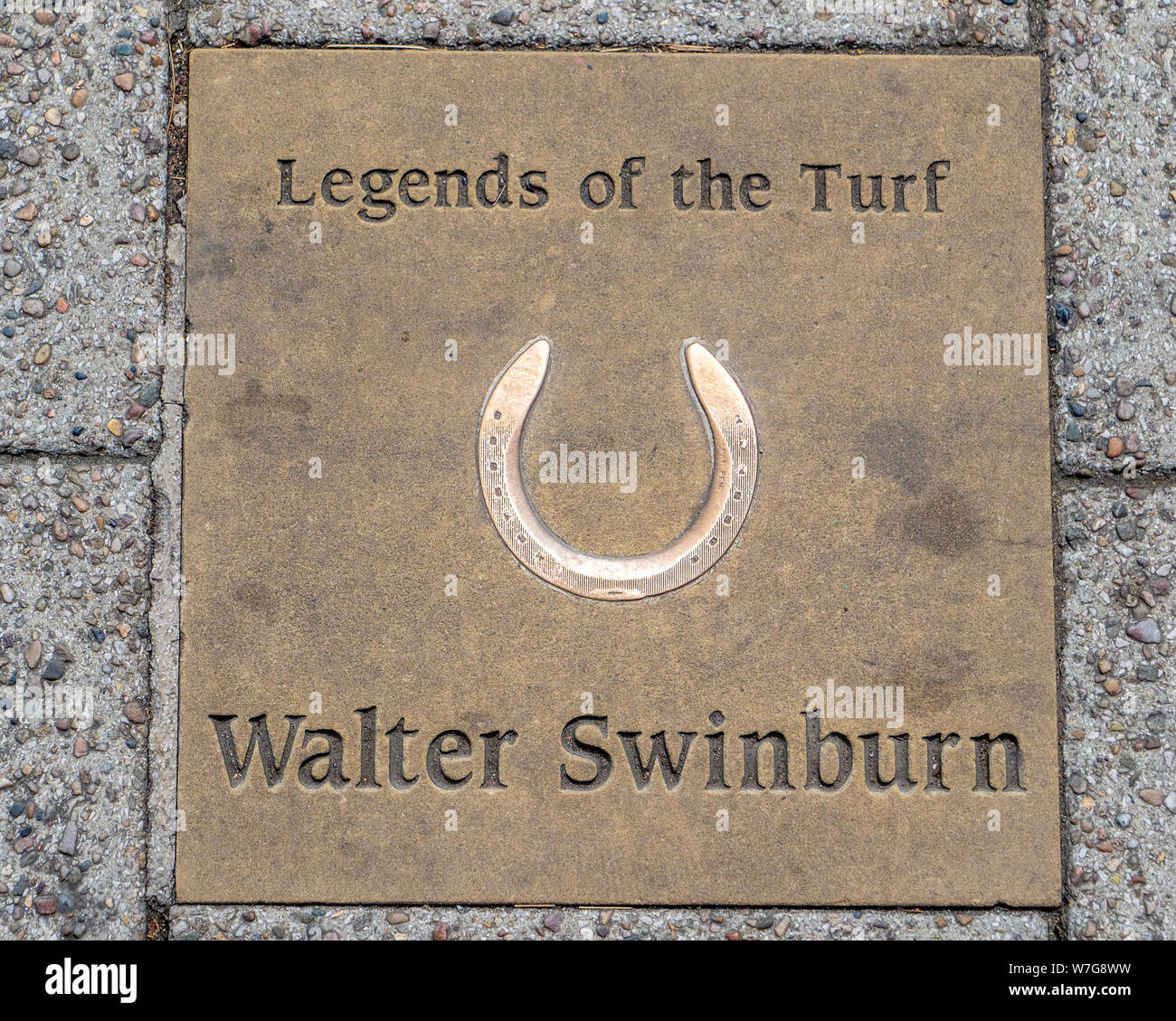 Legends of the Turf Newmarket - Newmarket's 'Walk of Fame' - commemorative paving slabs being laid in Newmarket High Street. Walter Swinburn - jockey Stock Photo