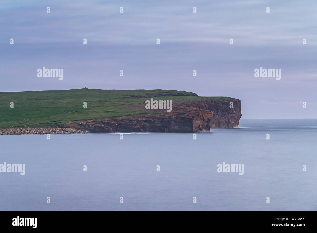 Long exposure in evening light over the Bay of Skaill on Orkney, Scotland Stock Photo