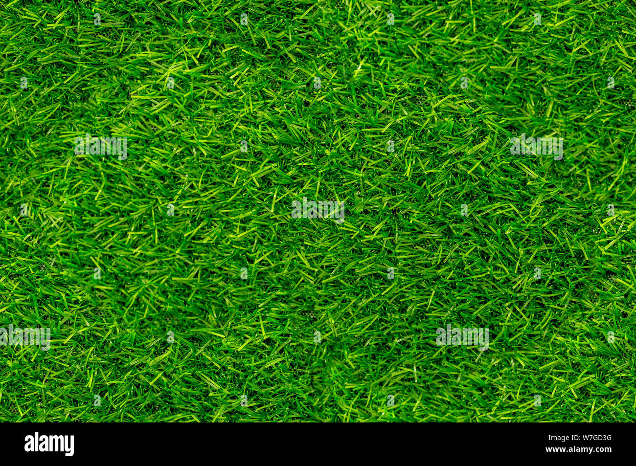 Green grass seamless texture. Seamless horizontal pattern. Artificial Grass background. Stock Photo