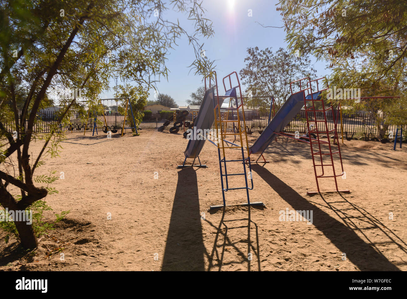 Slides, swings and climbing frames in an African village, Namibia Stock Photo
