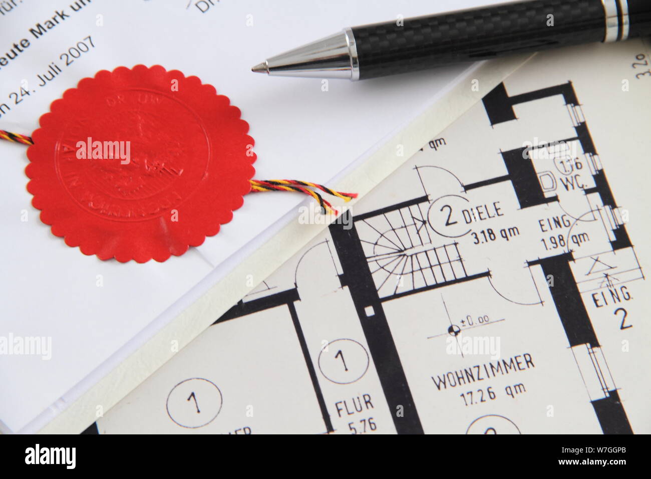 Notary seal with construction plan Stock Photo Alamy