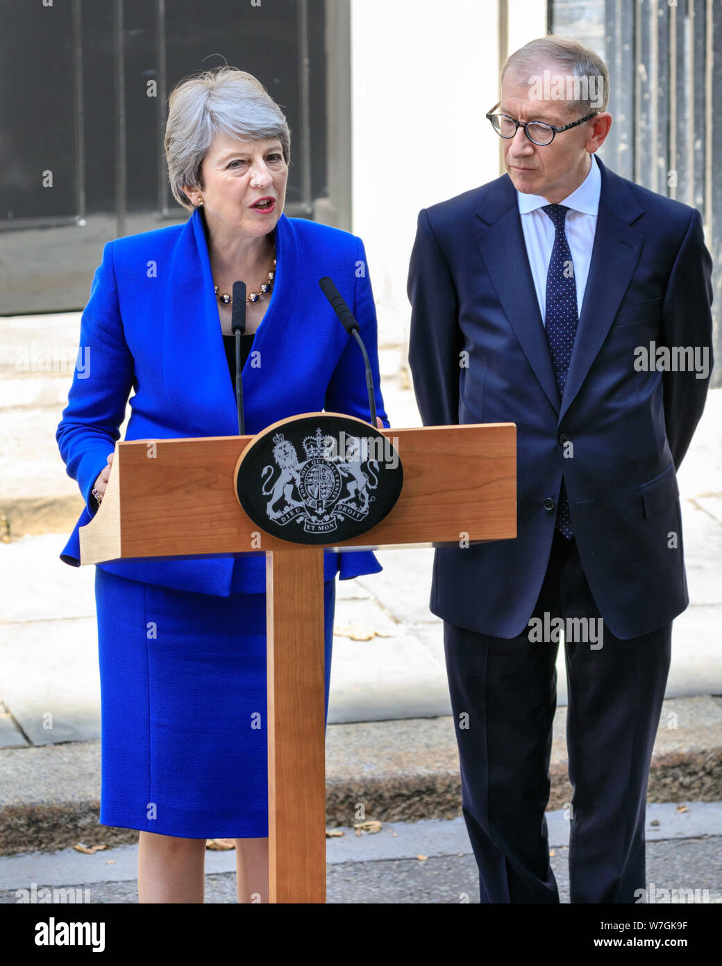 British Prime Minister Theresa May makes her farewell speech with husband Philip May by her side outside 10 Downing Street before her resignation that Stock Photo