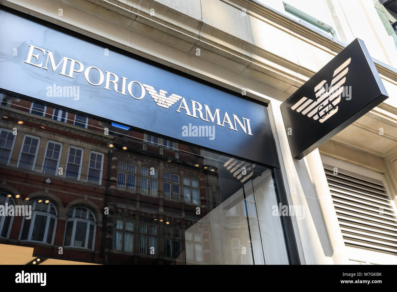 Emporio Armani brand retail fashion store shop exterior and logo in New  Bond Street, Mayfair, London, UK Stock Photo - Alamy