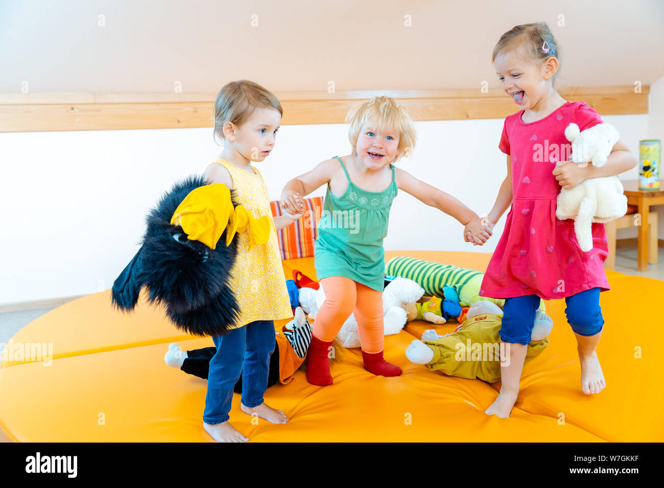 Children playing together in Kindergarten Stock Photo