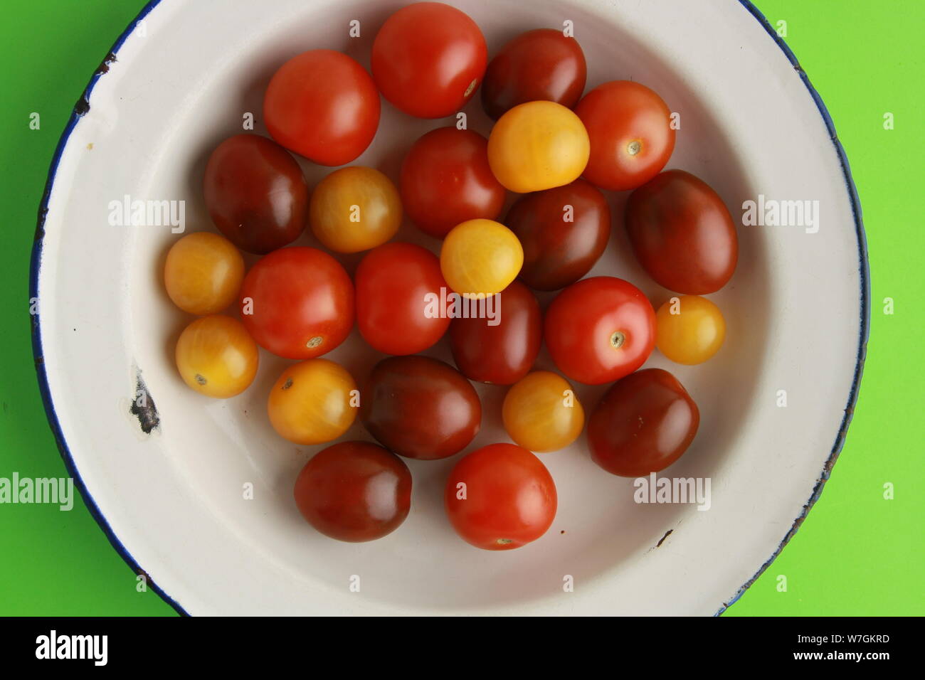 Three varieties of cherry tomatoes Stock Photo Alamy