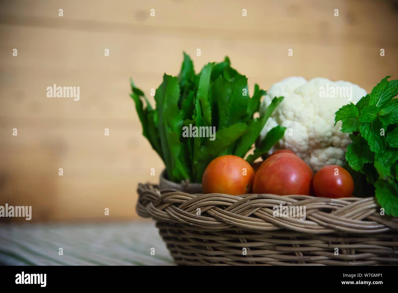 Fresh variety vegetable basket ready to be cooked in the kitchen - vegetable for making food background with copy space concept Stock Photo